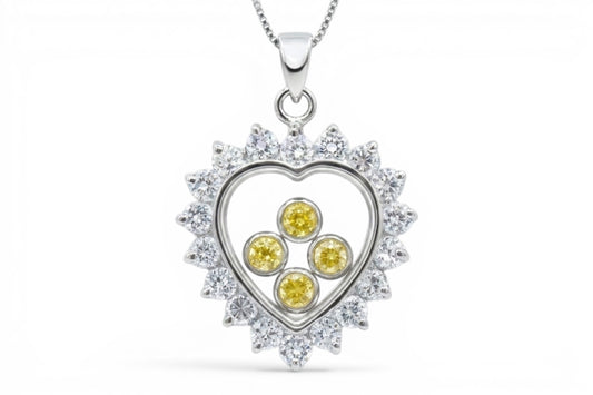 Sunshine - Sterling Silver clear CZ border heart shape pendant with yellow  floating CZ's on a Sterling Silver Chain