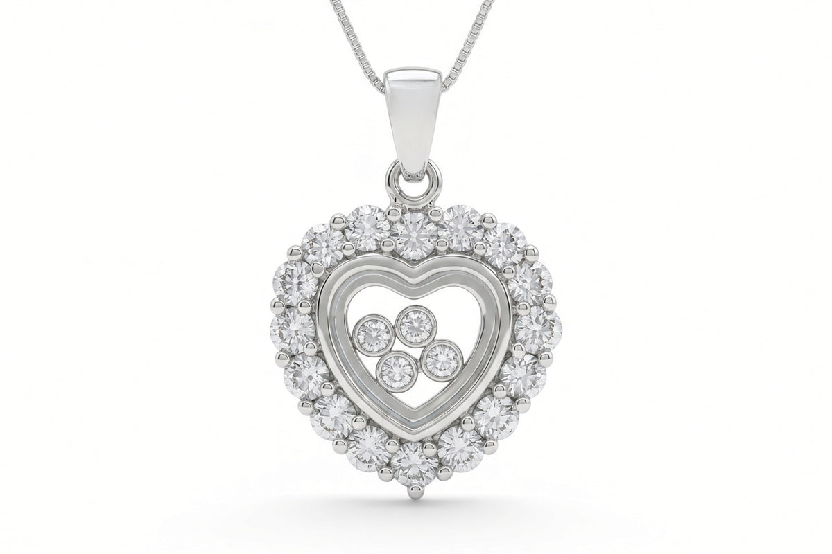 Madison - Pendentif en forme de cœur en argent sterling avec zircones cubiques flottants sur une chaîne en argent sterling