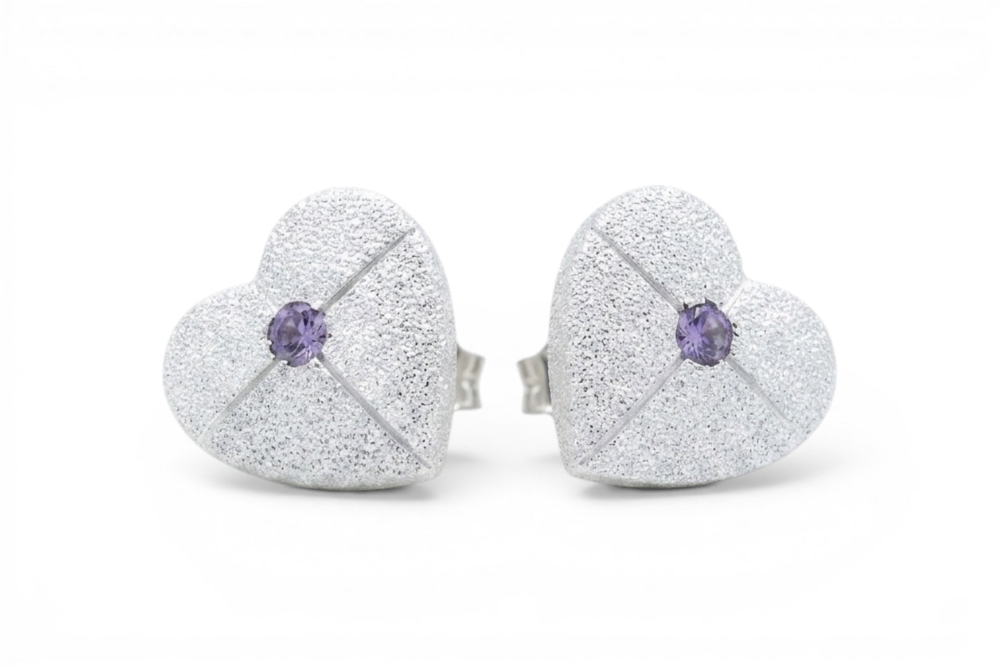 Liora- Sterling Silver 12mm heart shaped stud earrings cross engraved with lilac crystal