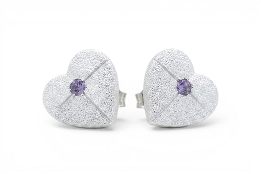 Liora- Sterling Silver 12mm heart shaped stud earrings cross engraved with lilac crystal